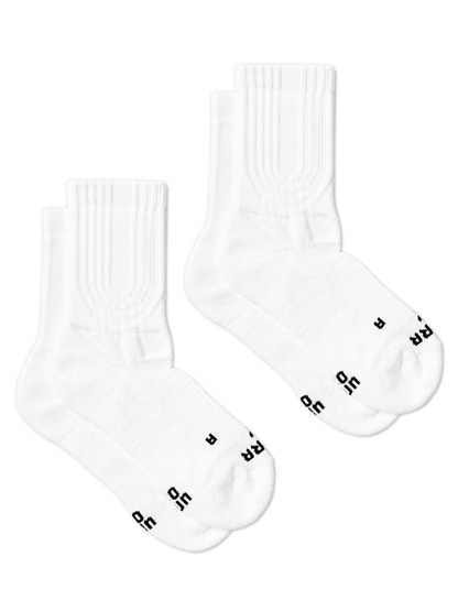 Two pairs of white crew socks with black lettering on the toes, arranged on a plain white background.