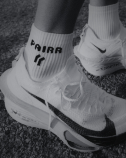 Lifestyle of Nike Alphaflys with quarter-length PAIRR White OG performance Running Socks