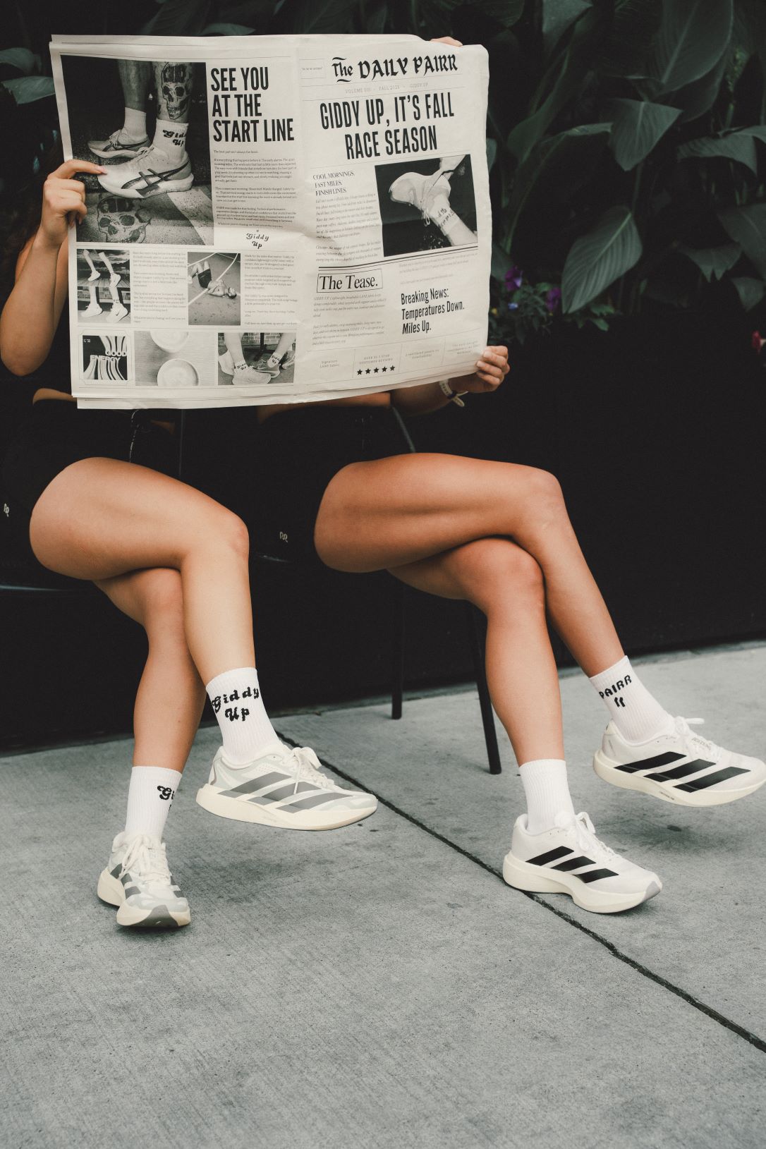 Two runners in Adidas running shoes with PAIRR Socks.