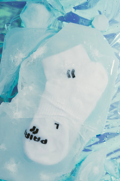 STRIDE cooling performance running sock in white ankle length. Female founded Canada company