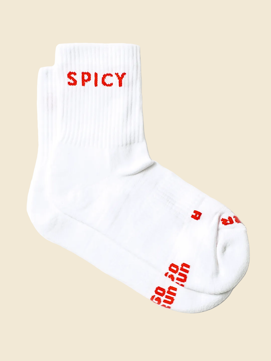 A pair of white running socks with bold red text. The top sock features the word 'SPICY' in red across the ribbed cuff, and the bottom sock features 'GO RUN' and 'SPICY' printed in red on the toe area.