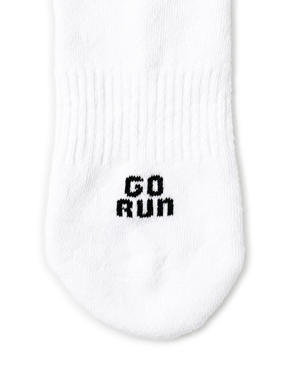 Bottom of PAIRR The 400 performance running sock showing GO RUN text and cushioned sole